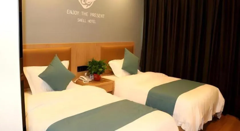 Bed in Shell Hotel Bozhou Lixin County Passenger Center