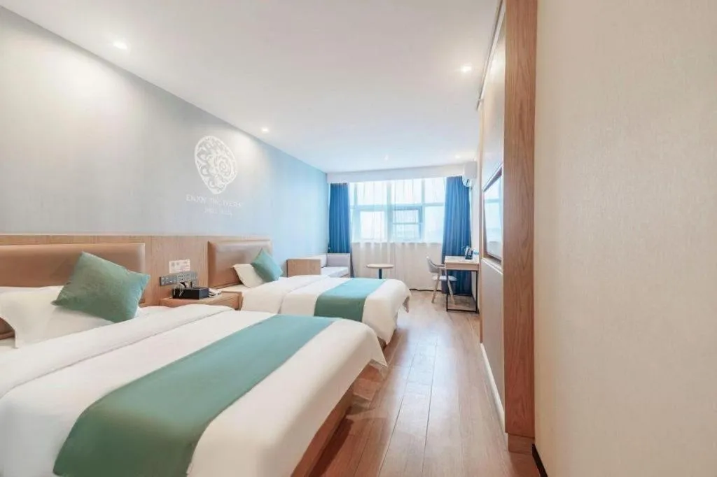 Bed in Shell Hotel Bozhou Lixin County Passenger Center