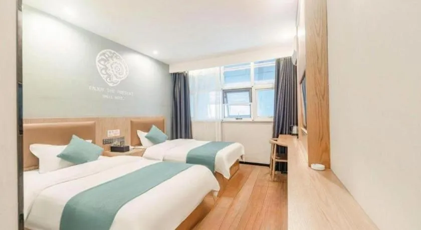Bed in Shell Hotel Bozhou Lixin County Passenger Center