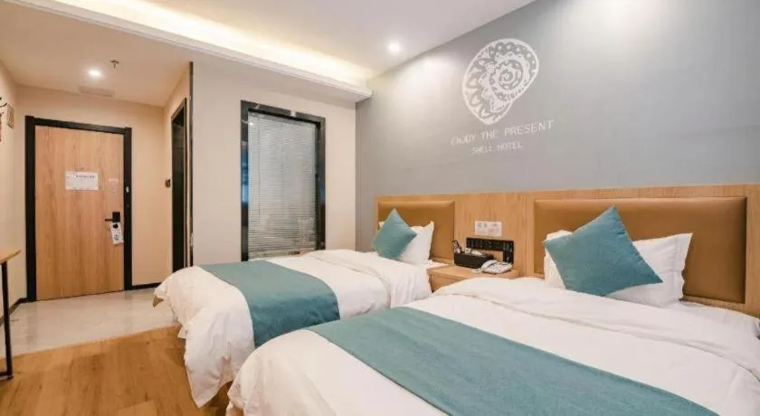Bed in Shell Hotel Bozhou Lixin County Passenger Center