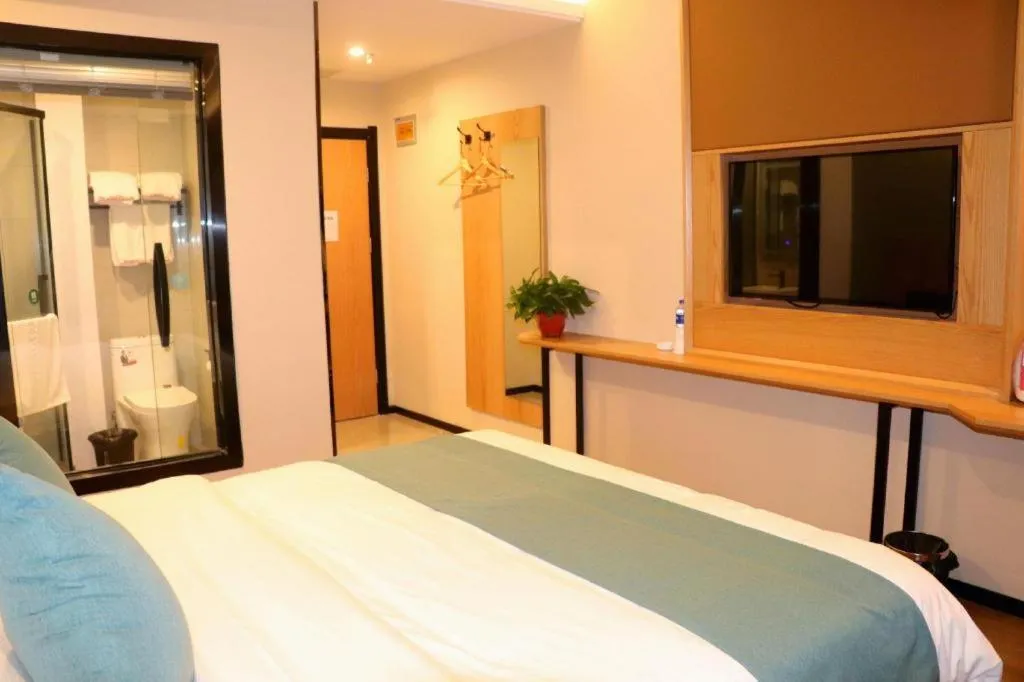 Bed in Shell Hotel Bozhou Lixin County Passenger Center