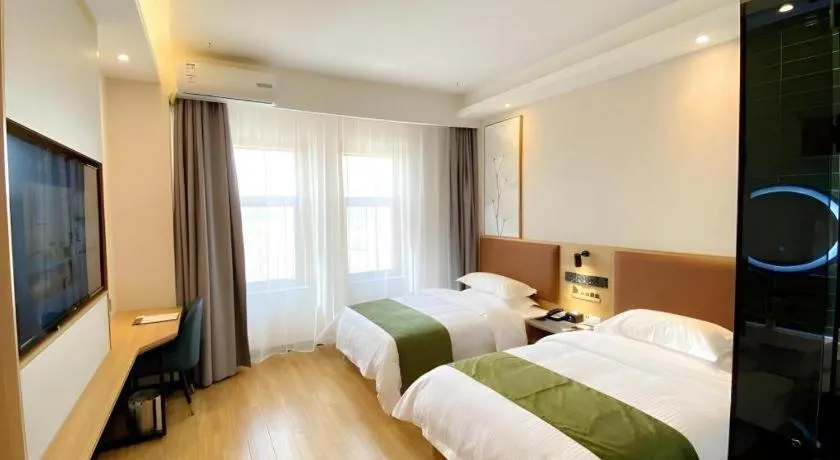 Bed in Green Tree Inn Express Inner Mongolia Ulan Qab High-Speed Railway Station