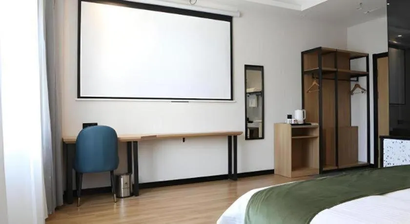 Bed in Green Tree Inn Express Inner Mongolia Ulan Qab High-Speed Railway Station