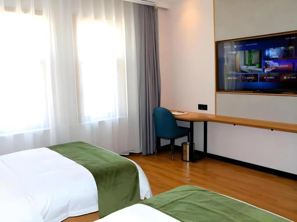 Bed in Green Tree Inn Express Inner Mongolia Ulan Qab High-Speed Railway Station