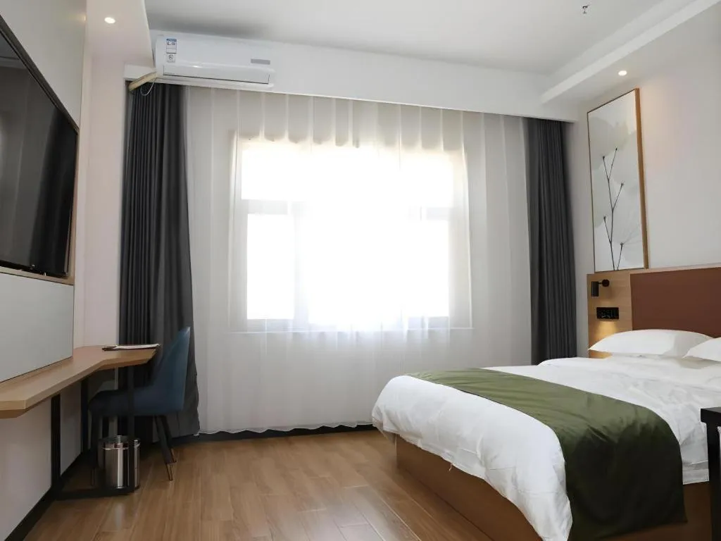 Bed in Green Tree Inn Express Inner Mongolia Ulan Qab High-Speed Railway Station