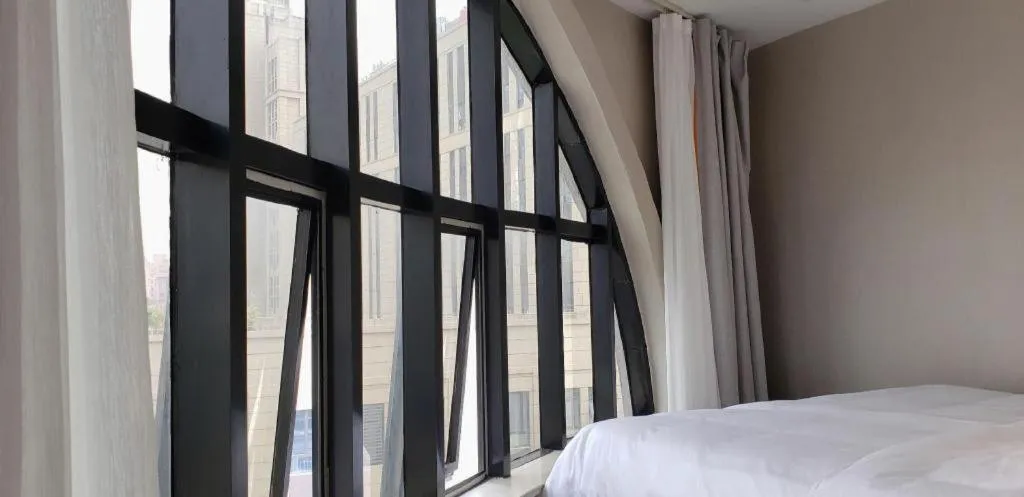 Bed in Gya Hotel Shanghai Xizang Bei Road Metro Station