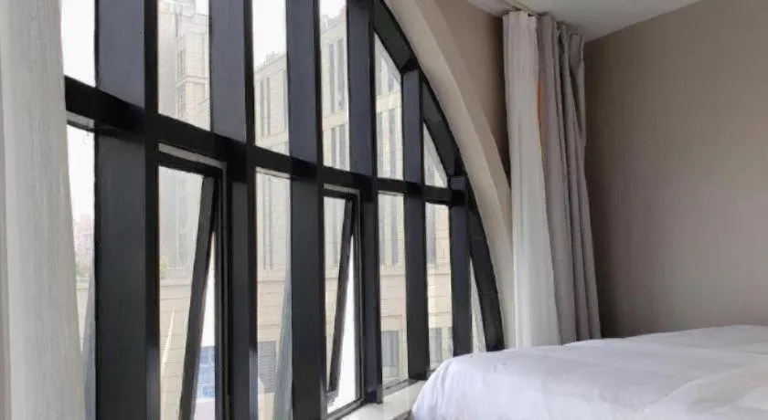 Bed in Gya Hotel Shanghai Xizang Bei Road Metro Station