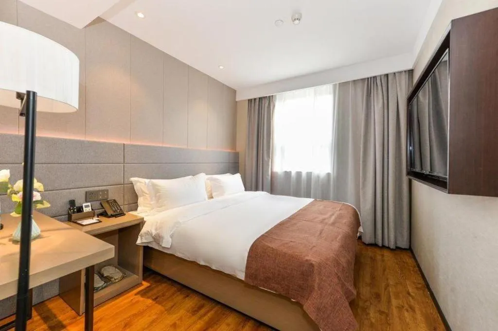 Bed in Gya Hotel Shanghai Xizang Bei Road Metro Station