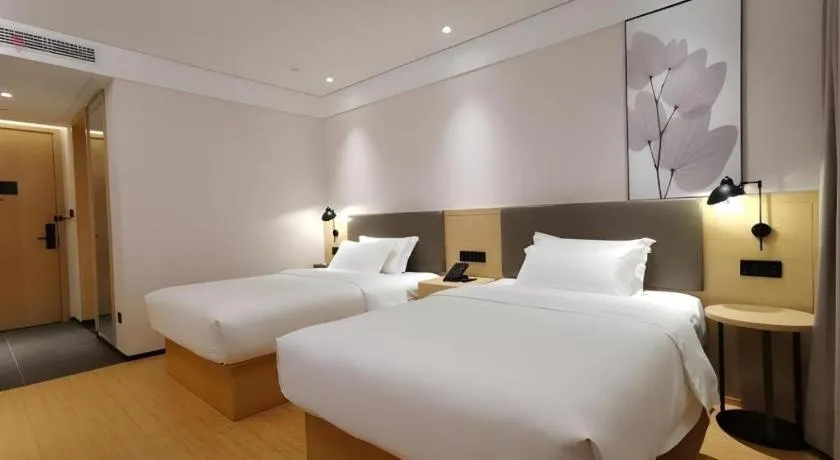 Bed in Green Tree Inn Xuzhou Tongshan Wanda Plaza Yuquanhe Metro Station