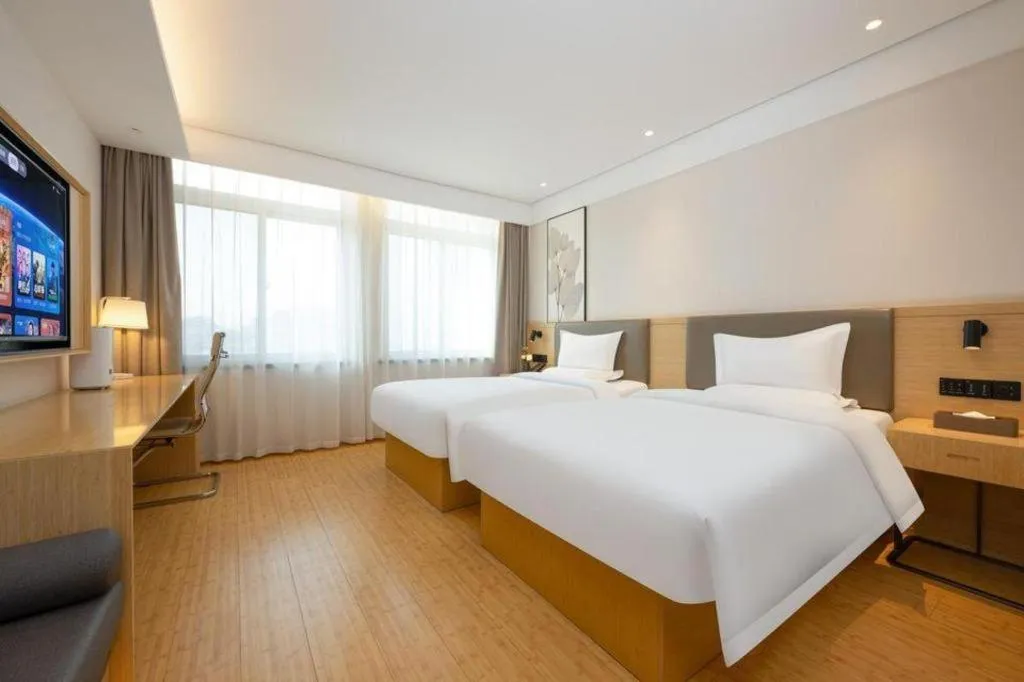 Bed in Green Tree Inn Xuzhou Tongshan Wanda Plaza Yuquanhe Metro Station