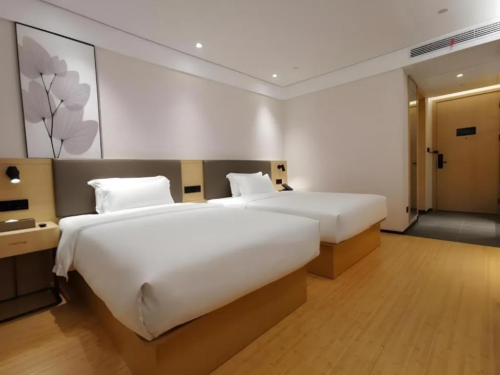 Bed in Green Tree Inn Xuzhou Tongshan Wanda Plaza Yuquanhe Metro Station
