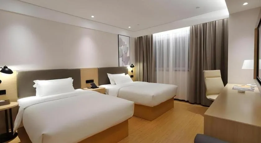 Bed in Green Tree Inn Xuzhou Tongshan Wanda Plaza Yuquanhe Metro Station