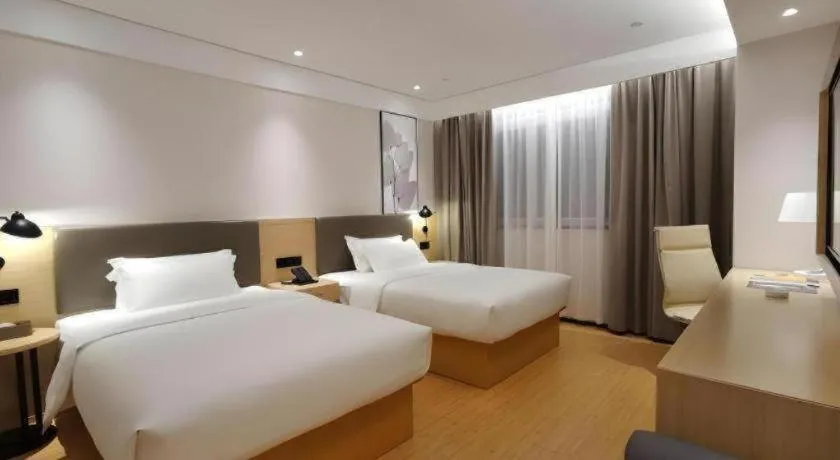 Bed in Green Tree Inn Xuzhou Tongshan Wanda Plaza Yuquanhe Metro Station