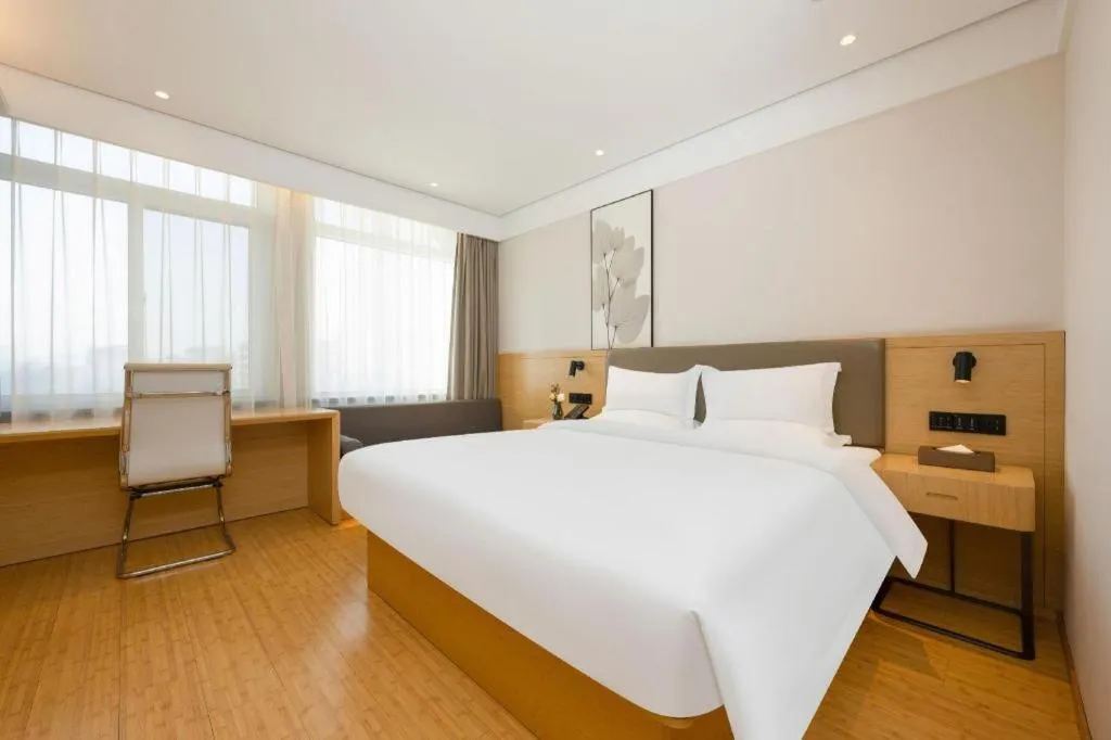 Bed in Green Tree Inn Xuzhou Tongshan Wanda Plaza Yuquanhe Metro Station