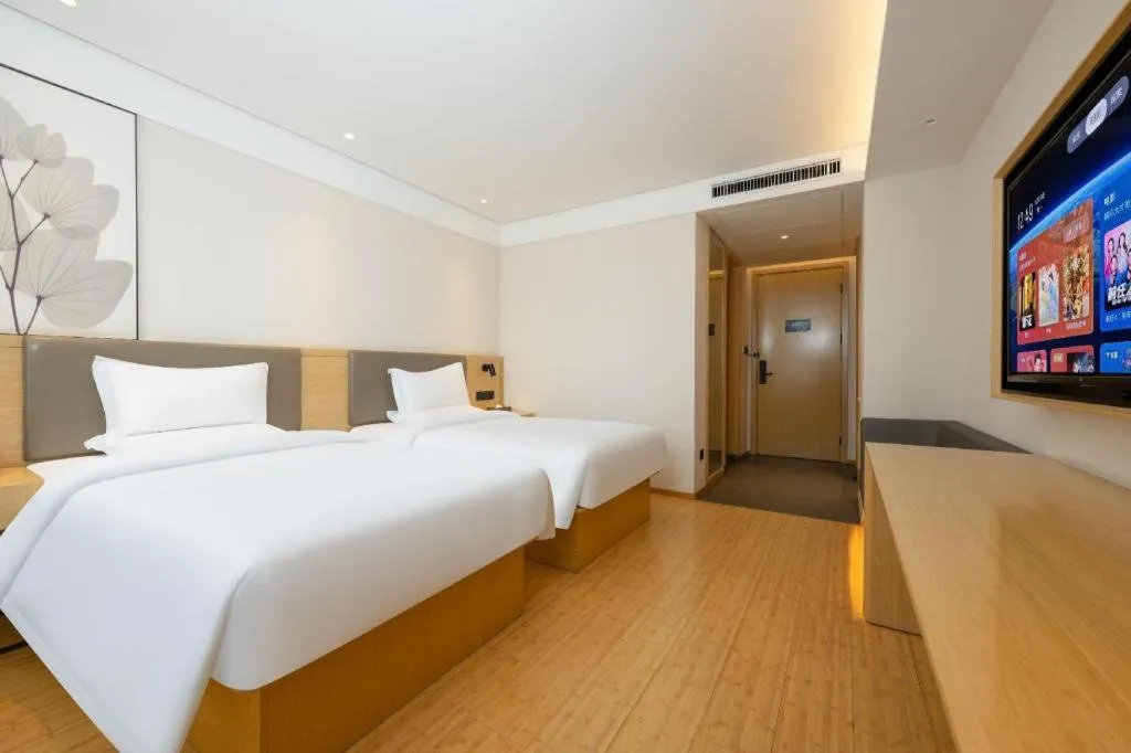 Bed in Green Tree Inn Xuzhou Tongshan Wanda Plaza Yuquanhe Metro Station
