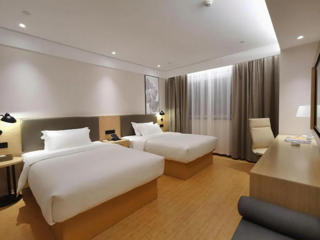 Bed in Green Tree Inn Xuzhou Tongshan Wanda Plaza Yuquanhe Metro Station