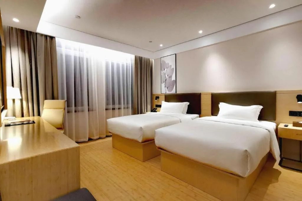 Bed in Green Tree Inn Xuzhou Tongshan Wanda Plaza Yuquanhe Metro Station