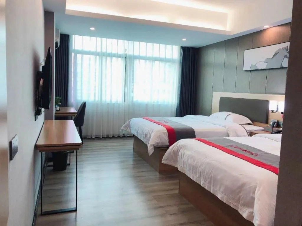 Bed in Jun Hotel Guangdong Zhanjiang Xiashan South Railway Station