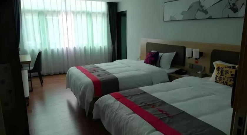 Bed in Jun Hotel Guangdong Zhanjiang Xiashan South Railway Station