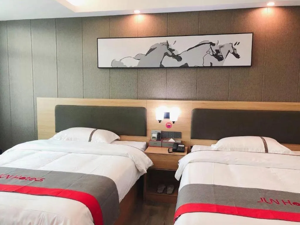 Bed in Jun Hotel Guangdong Zhanjiang Xiashan South Railway Station