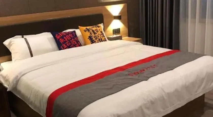 Bed in Jun Hotel Guangdong Zhanjiang Xiashan South Railway Station