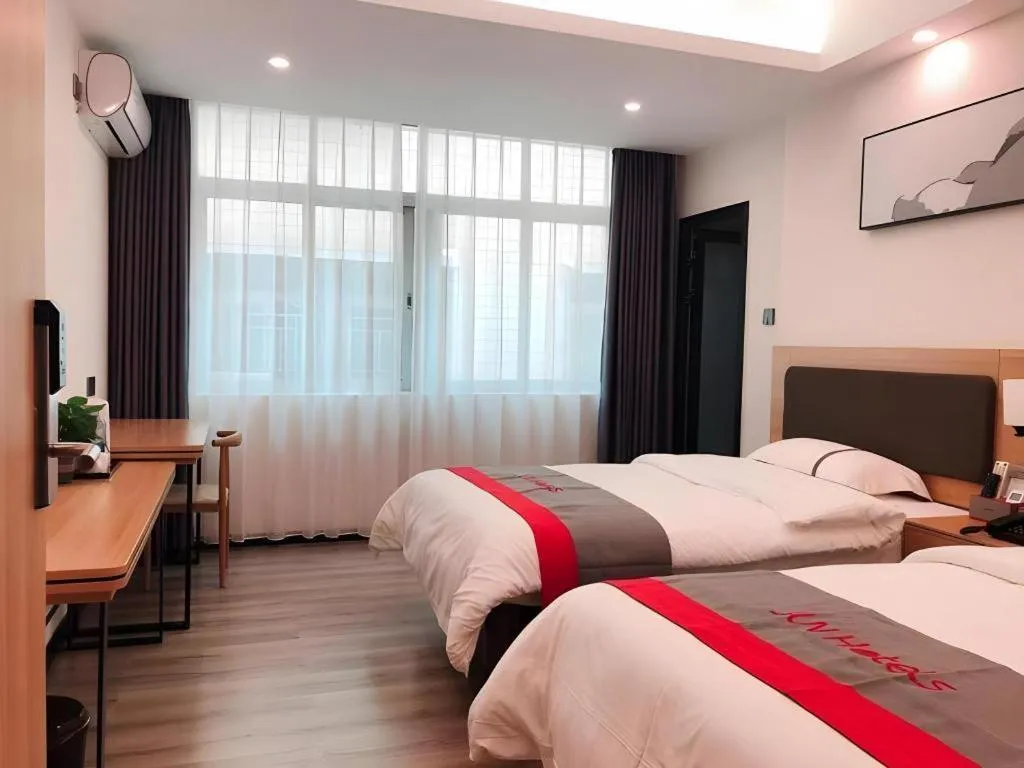 Bed in Jun Hotel Guangdong Zhanjiang Xiashan South Railway Station