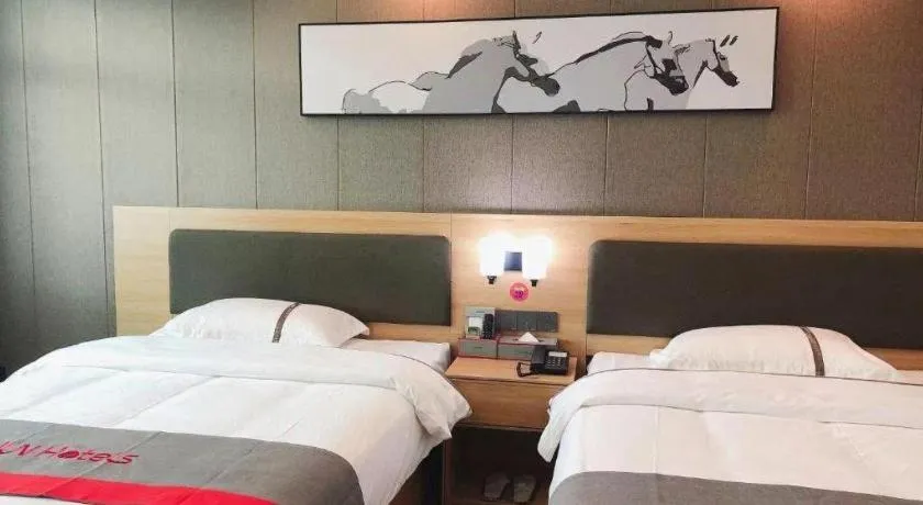 Bed in Jun Hotel Guangdong Zhanjiang Xiashan South Railway Station