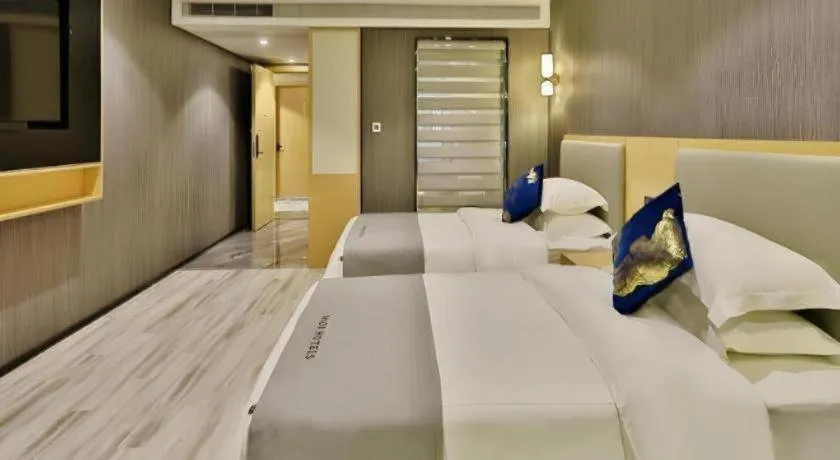 Bed in MIDI Hotel Guangdong Chaozhou Xiangqiao District Hanshan Teachers College