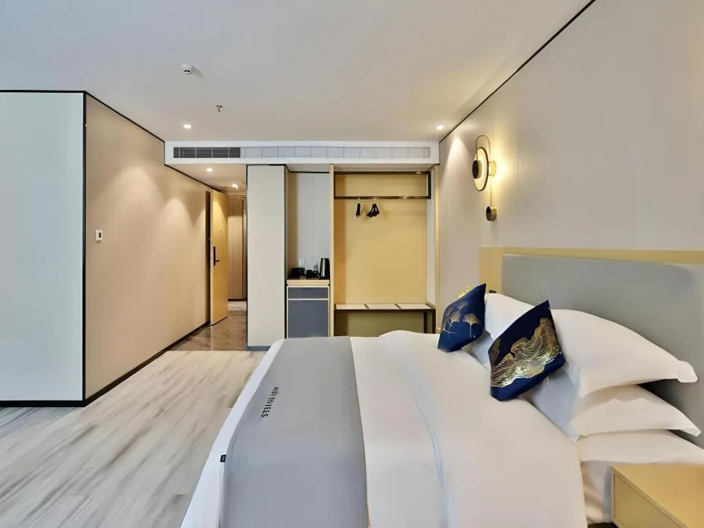 Bed in MIDI Hotel Guangdong Chaozhou Xiangqiao District Hanshan Teachers College