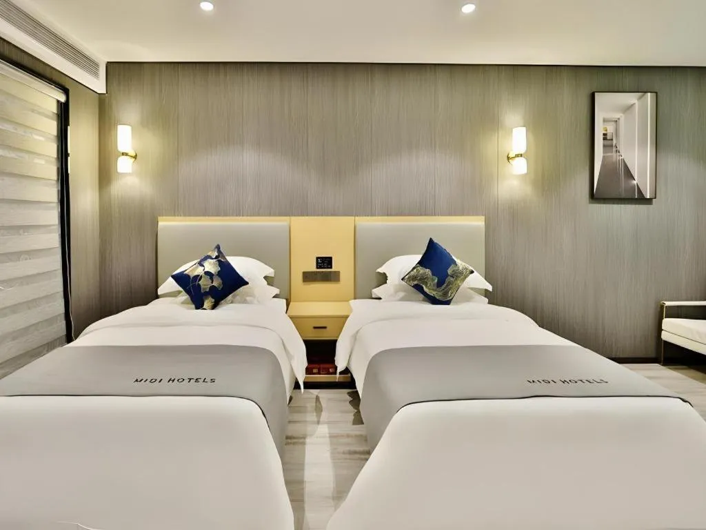 Bed in MIDI Hotel Guangdong Chaozhou Xiangqiao District Hanshan Teachers College