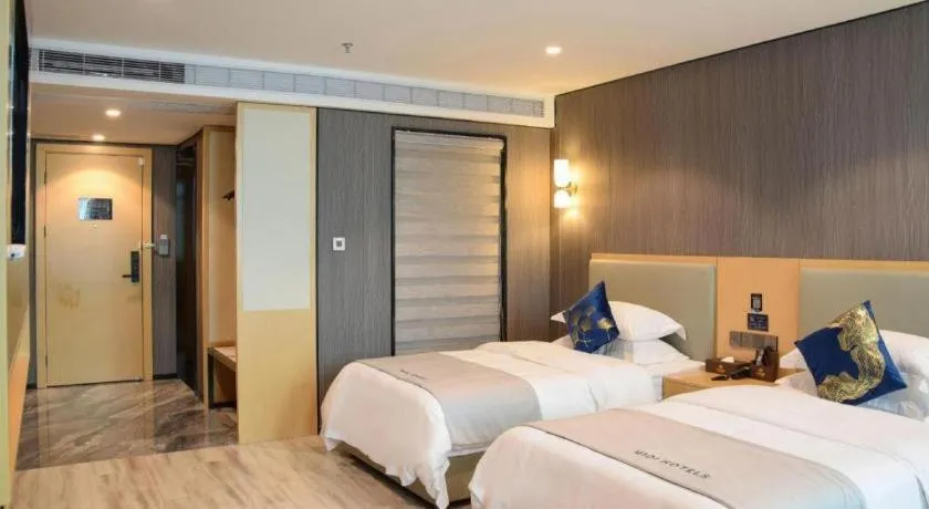 Bed in MIDI Hotel Guangdong Chaozhou Xiangqiao District Hanshan Teachers College
