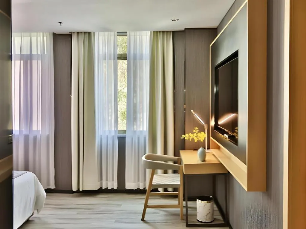 Bed in MIDI Hotel Guangdong Chaozhou Xiangqiao District Hanshan Teachers College