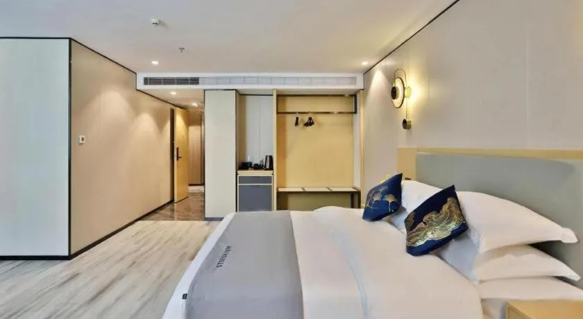 Bed in MIDI Hotel Guangdong Chaozhou Xiangqiao District Hanshan Teachers College