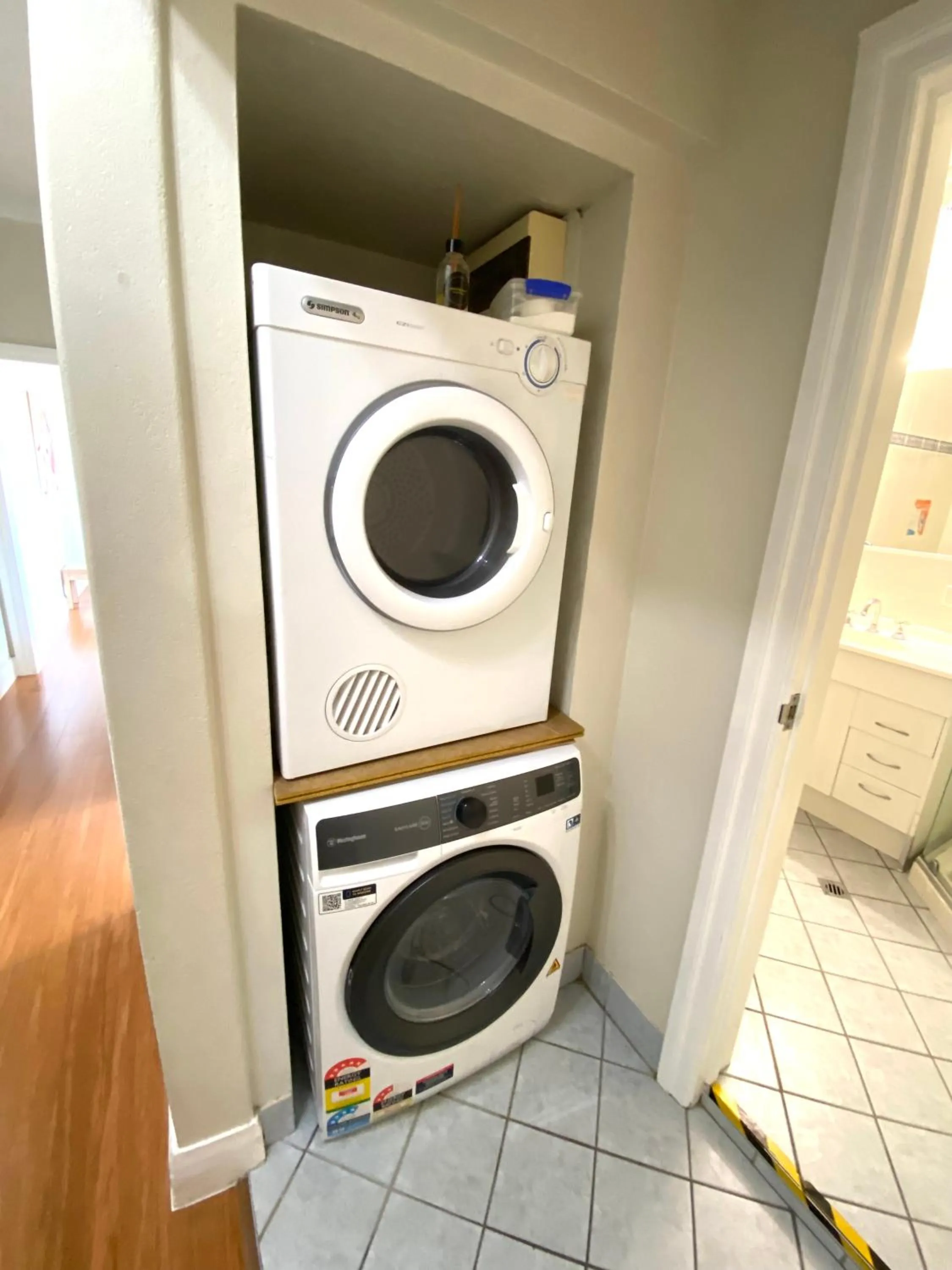 washing machine in Hampton Court Apartments