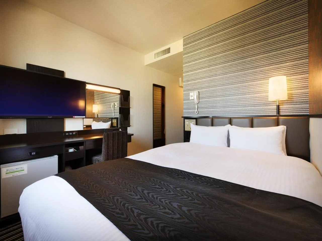 Bed in APA Hotel Isesaki-Eki Minami