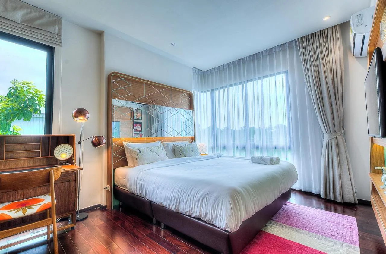 Photo of the whole room, Bed in The Title Boutique Phuket