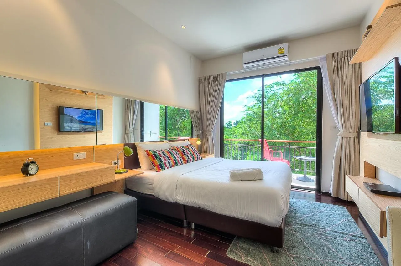 Photo of the whole room, Bed in The Title Boutique Phuket