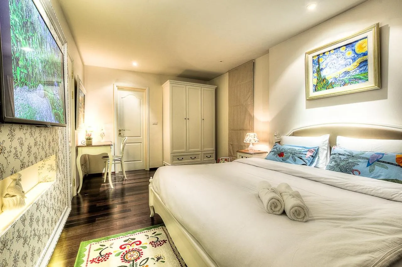 Photo of the whole room, Bed in The Title Boutique Phuket