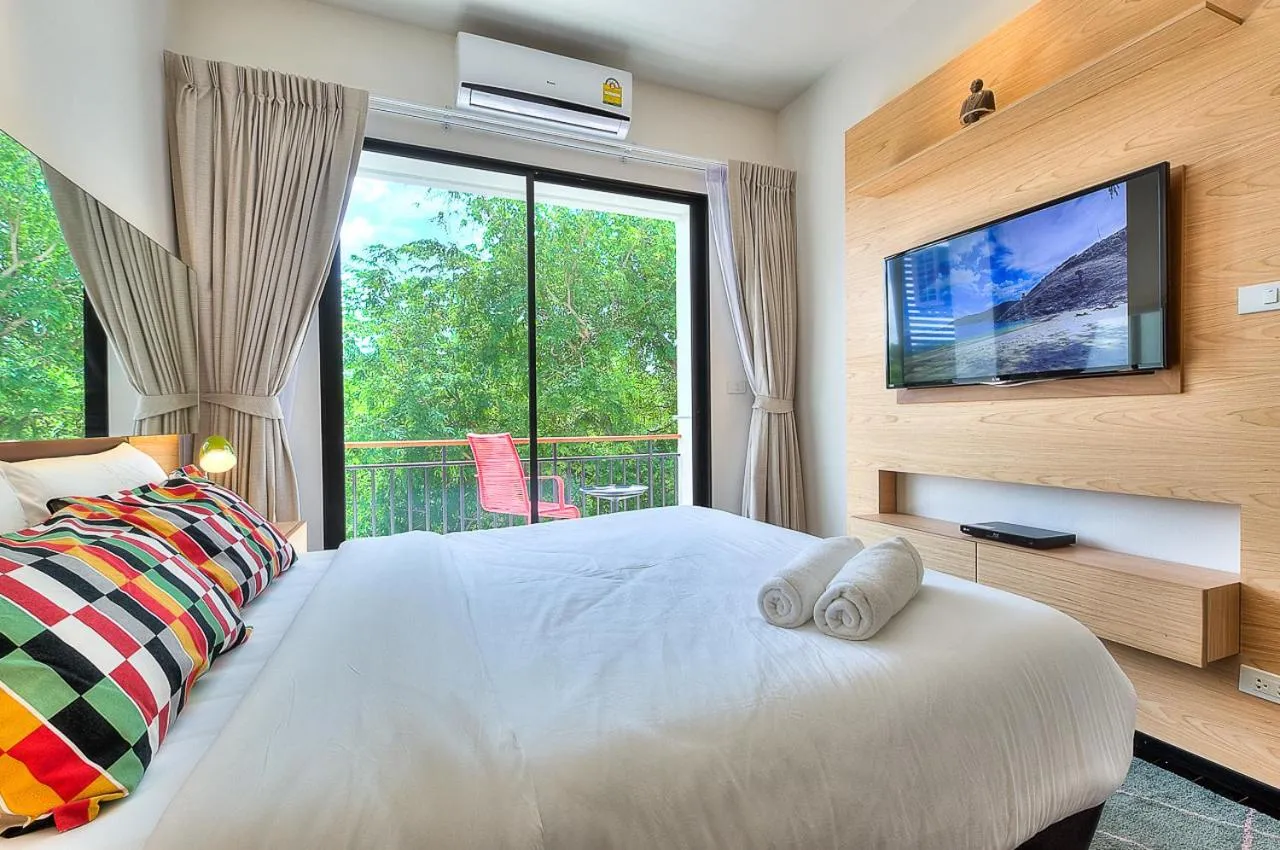 Photo of the whole room, Bed in The Title Boutique Phuket