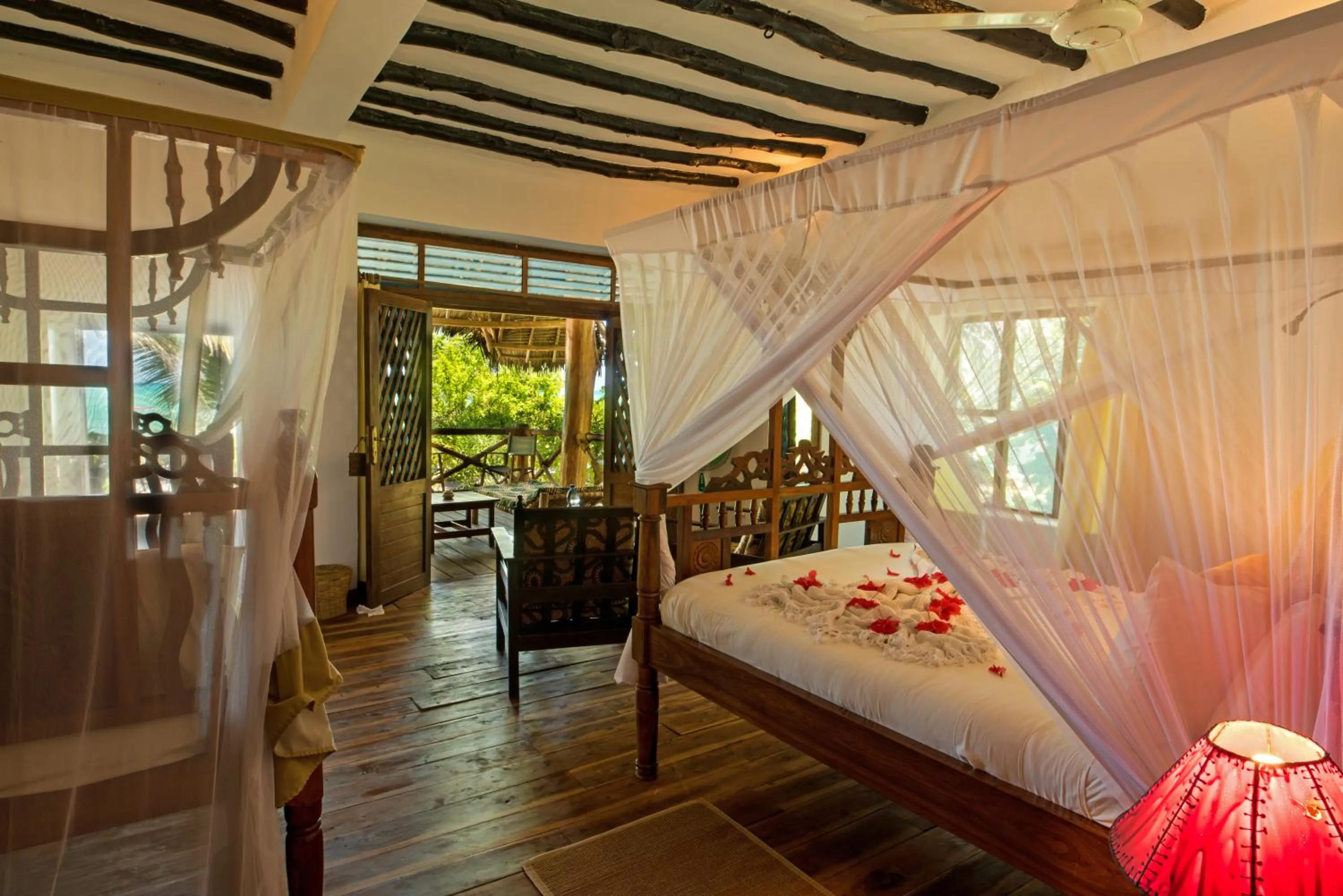 Balcony/Terrace, Bed in Pongwe Beach Hotel