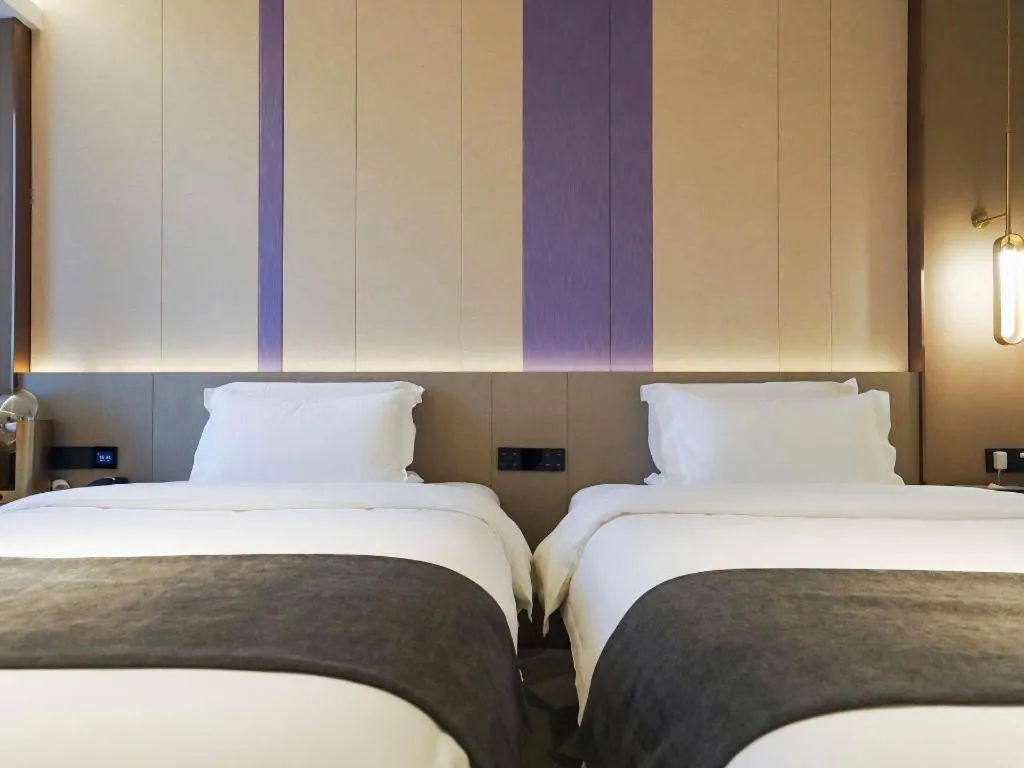 Bed in Lavande Hotel Shanghai Jing'an Shibei Gaoxin