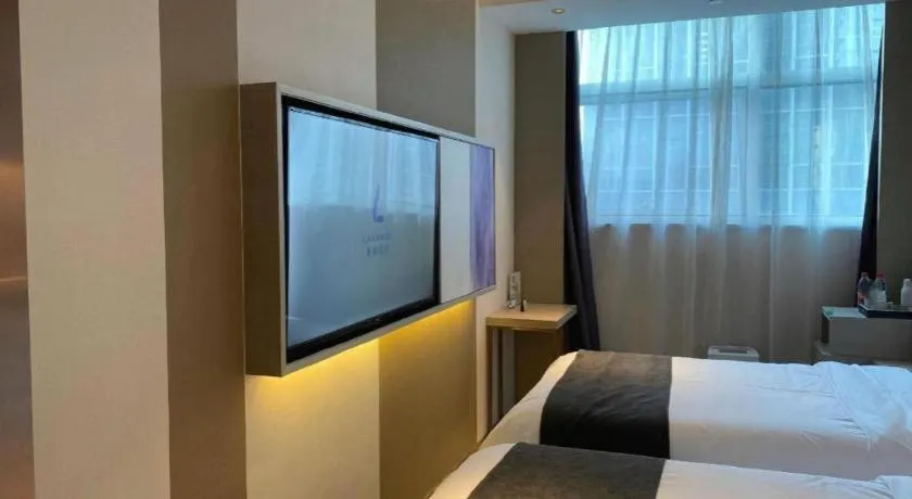 Bed in Lavande Hotel Shanghai Jing'an Shibei Gaoxin