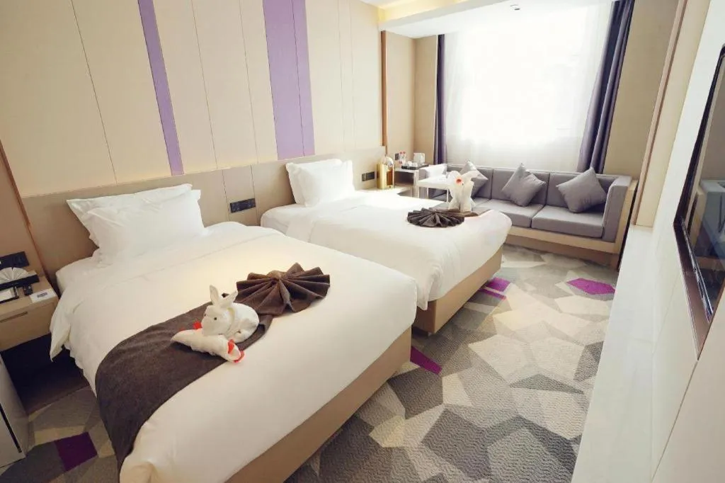 Bed in Lavande Hotel Shanghai Jing'an Shibei Gaoxin