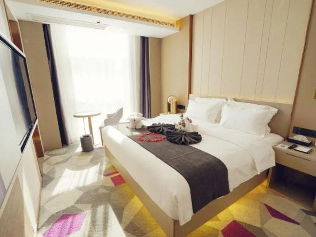 Bed in Lavande Hotel Shanghai Jing'an Shibei Gaoxin