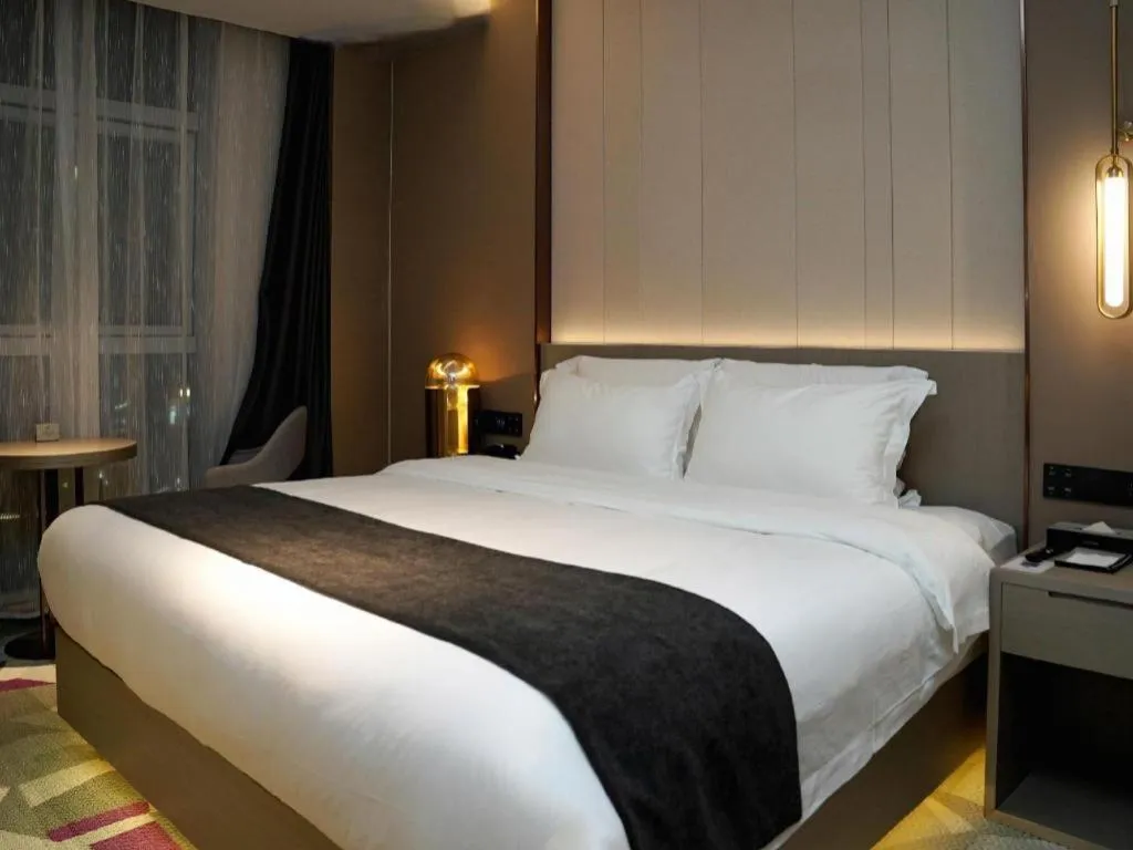 Bed in Lavande Hotel Shanghai Jing'an Shibei Gaoxin