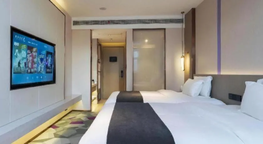 Bed in Lavande Hotel Shanghai Jing'an Shibei Gaoxin