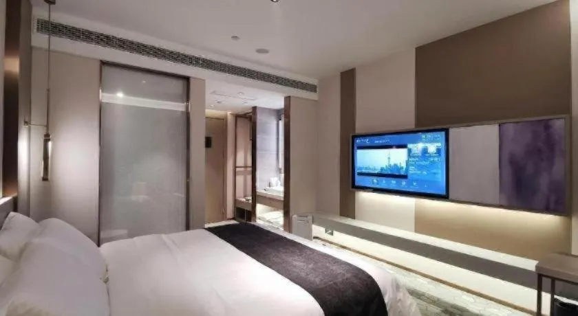 Bed in Lavande Hotel Shanghai Jing'an Shibei Gaoxin