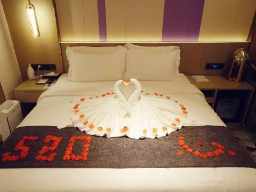 Bed in Lavande Hotel Shanghai Jing'an Shibei Gaoxin