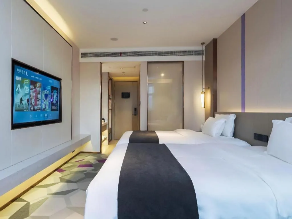 Bed in Lavande Hotel Shanghai Jing'an Shibei Gaoxin