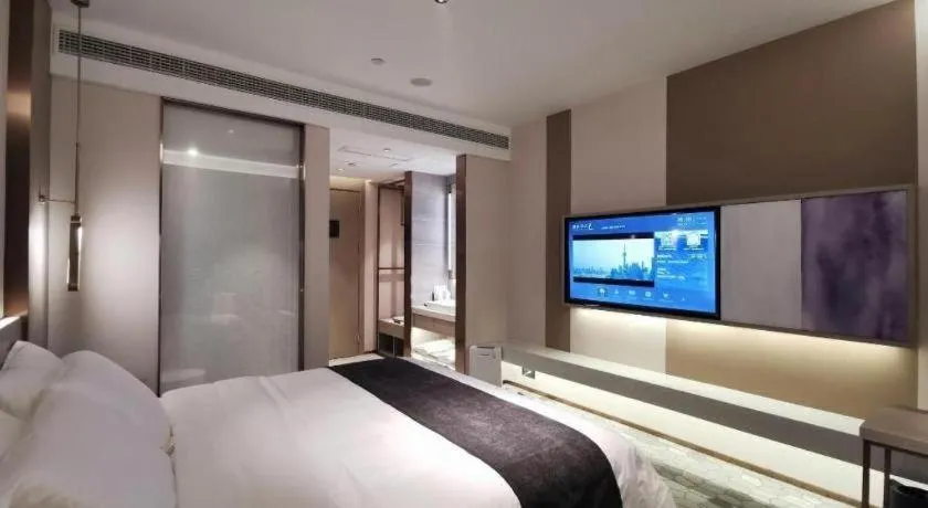 Bed in Lavande Hotel Shanghai Jing'an Shibei Gaoxin